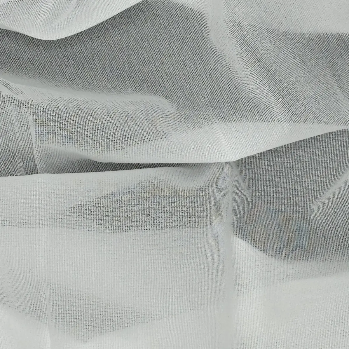 Thermocollant Transparent Blanc Tricoté insertion de trame 24 g/m² - Lainière Paris