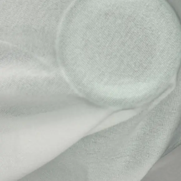 Thermocollant Transparent Blanc Tricoté insertion de trame 24 g/m² - Lainière Paris - 2
