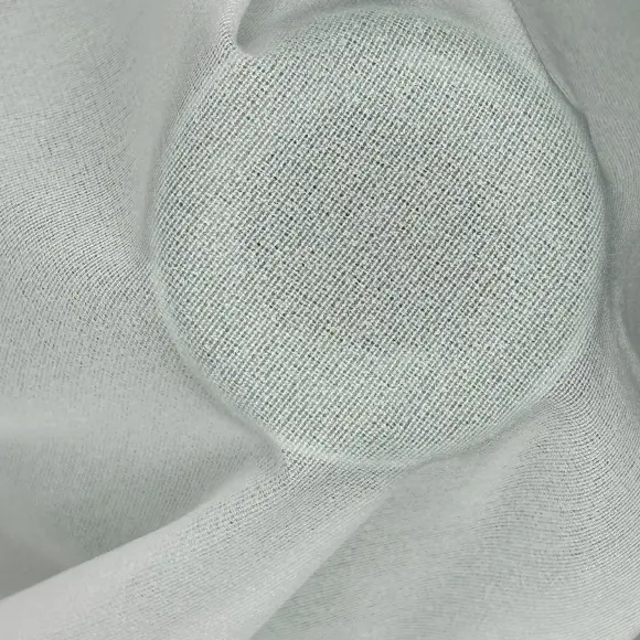 Thermocollant Transparent Naturel Tricoté insertion de trame 24 g/m² - Lainière Paris - 2