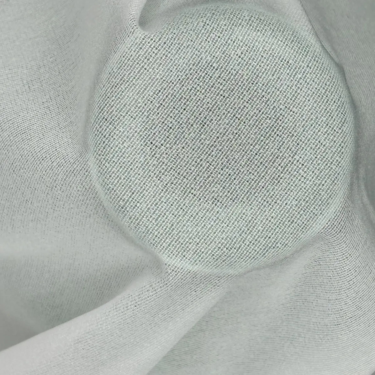 Thermocollant Transparent Naturel Tricoté insertion de trame 24 g/m² - Lainière Paris