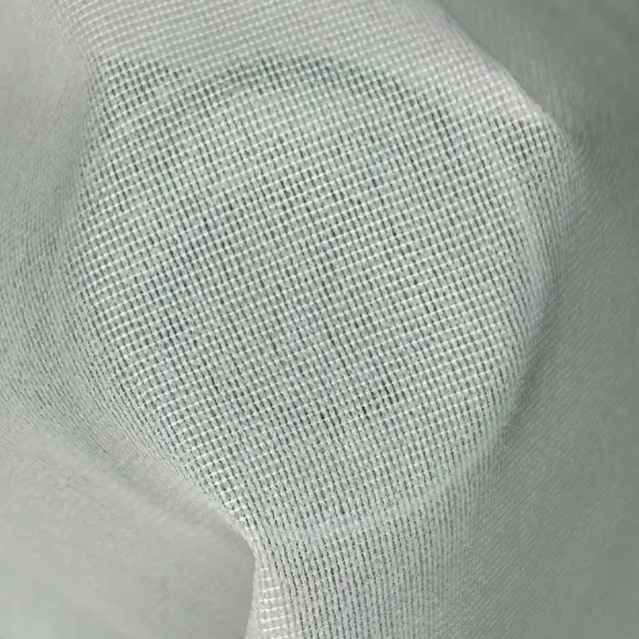 Fusible interfacing Semi-transparent White Warp knit weft inserted 66 g/m² - DHJ, Lainière Paris - 2