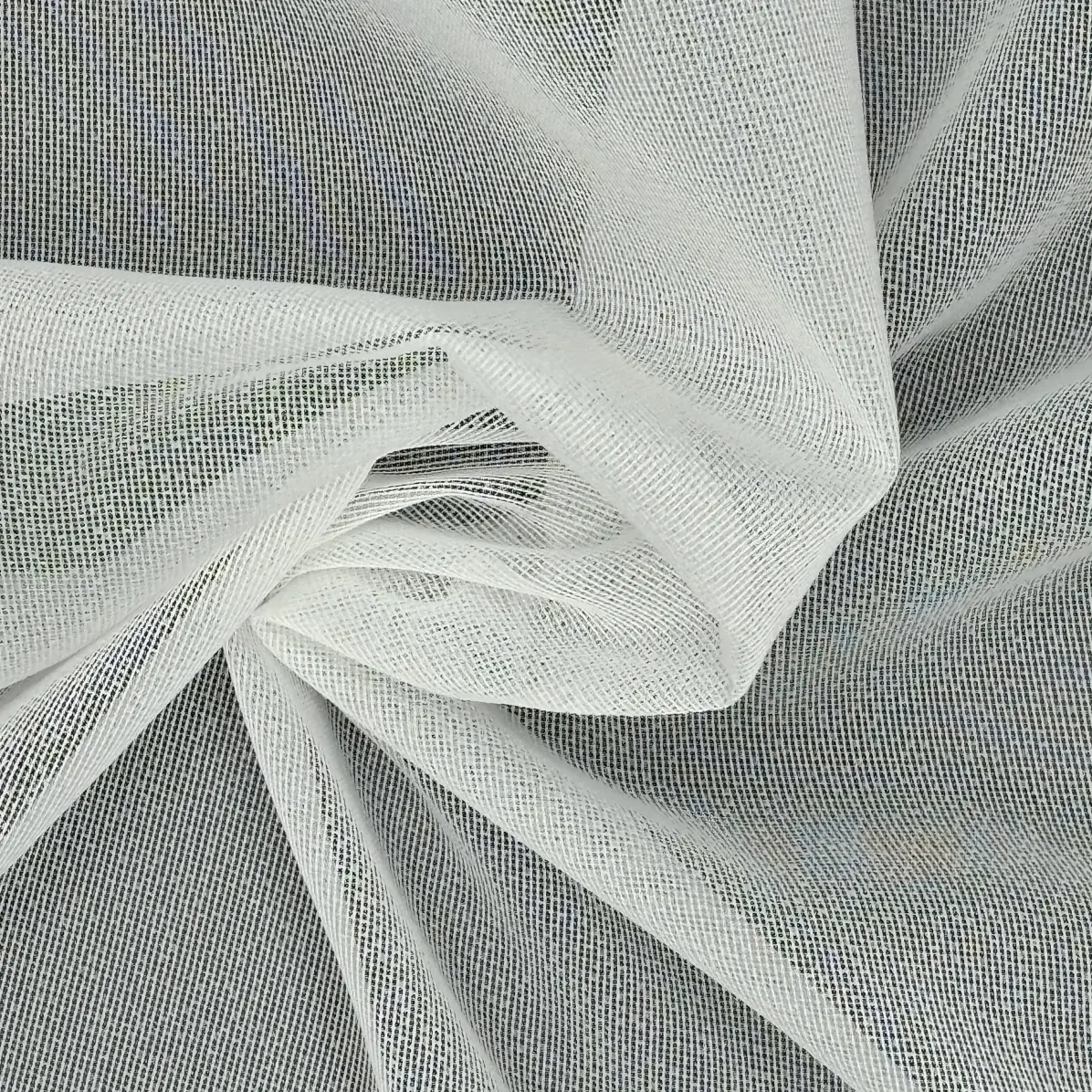 Fusible interfacing Transparent Natural Warp knit weft inserted 40 g/m² - Lainière Paris