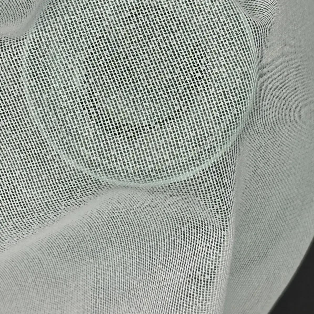 Fusible interfacing Transparent Natural Warp knit weft inserted 40 g/m² - Lainière Paris