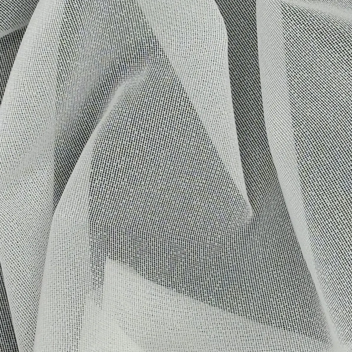 Fusible interfacing Transparent Natural Warp knit weft inserted 40 g/m² - Lainière Paris