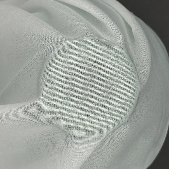 Thermocollant Transparent Blanc Tricoté insertion de trame 26 g/m² - Lainière Paris - 2