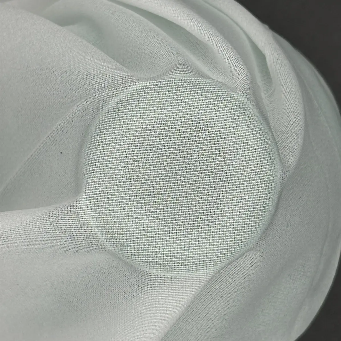 Thermocollant Transparent Blanc Tricoté insertion de trame 26 g/m² - Lainière Paris