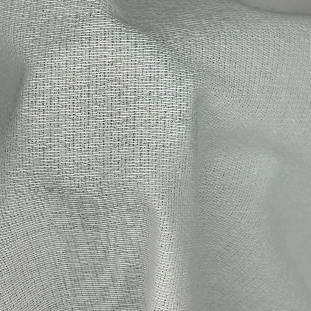 Thermocollant Opaque Blanc Tricoté insertion de trame 97 g/m² - Lainière Paris