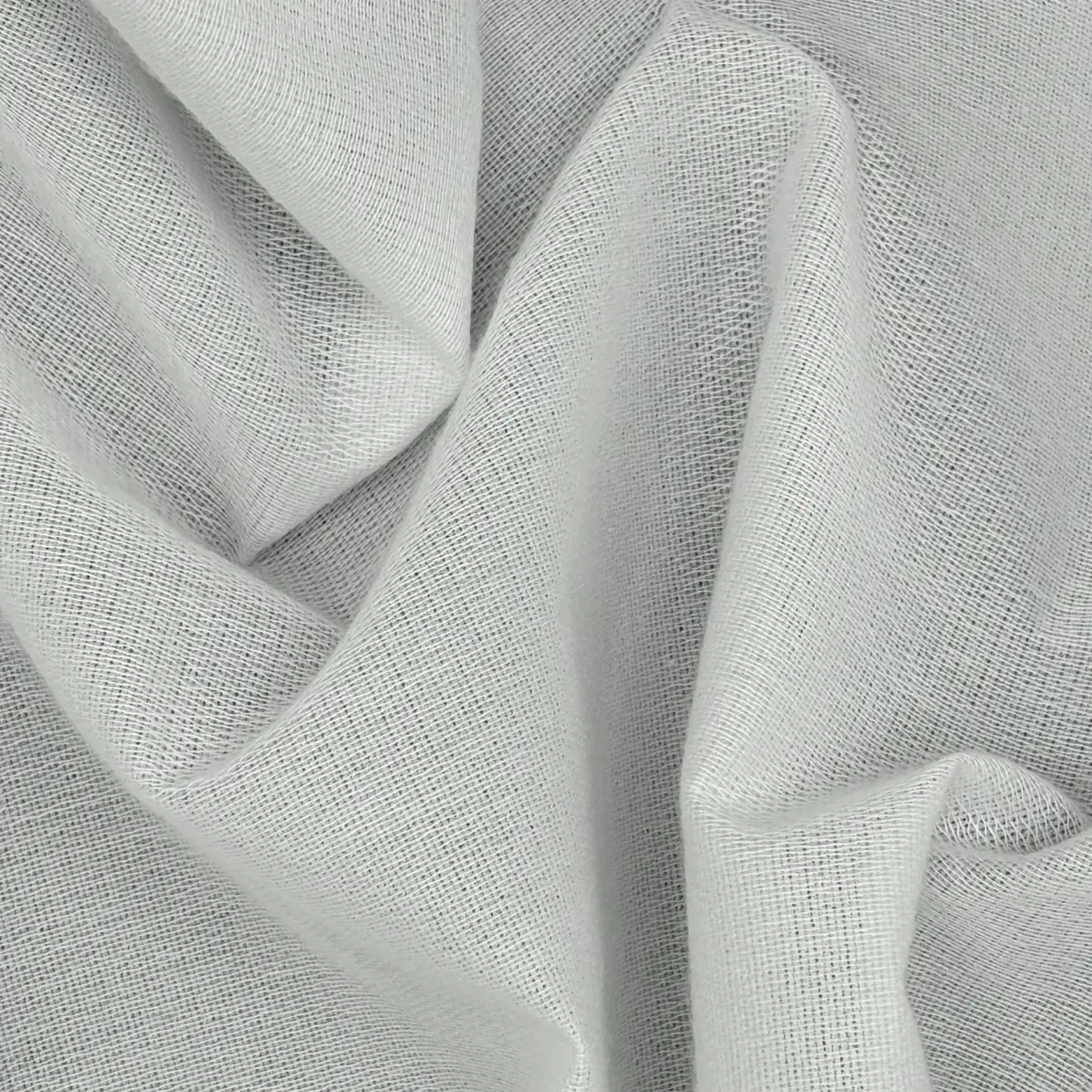 Thermocollant Opaque Blanc Tricoté insertion de trame 97 g/m² - Lainière Paris