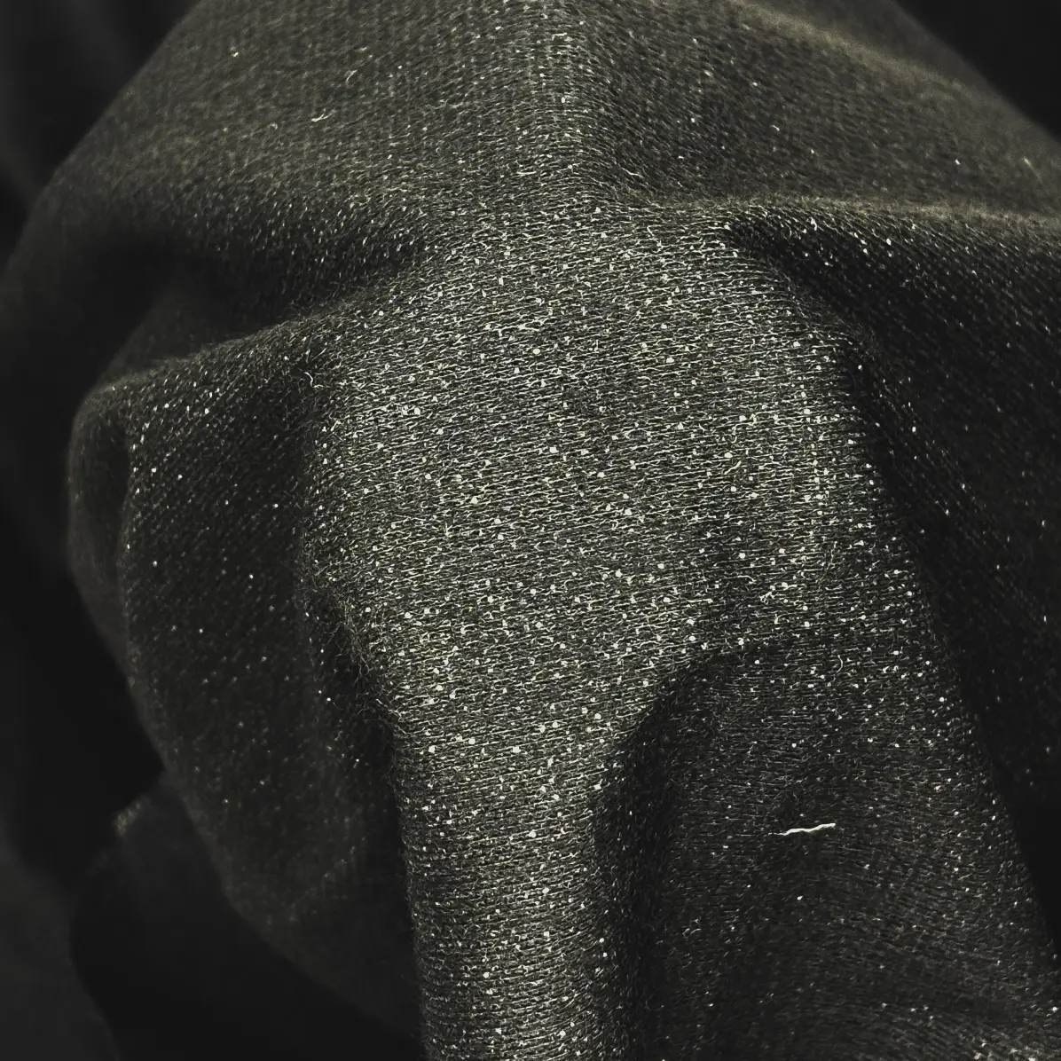 Thermocollant Opaque Noir Tricoté insertion de trame 75 g/m² - Lainière Paris