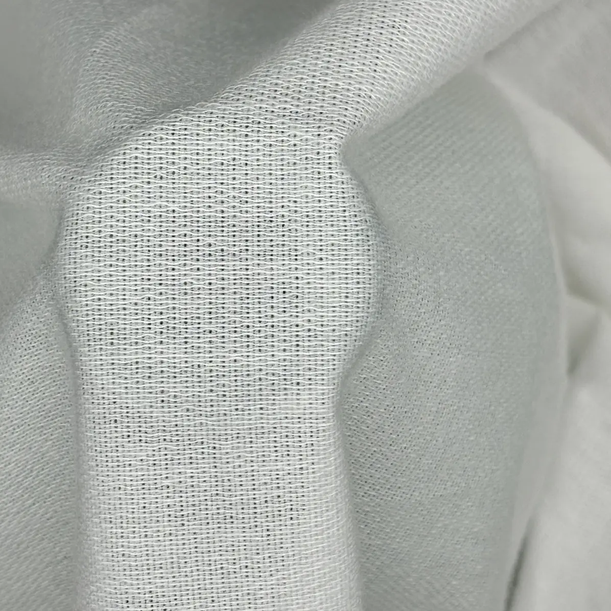 Thermocollant Opaque Blanc Tricoté insertion de trame 75 g/m² - Lainière Paris